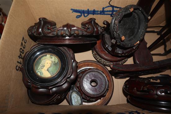 A group of Chinese wood stands including a dish stand